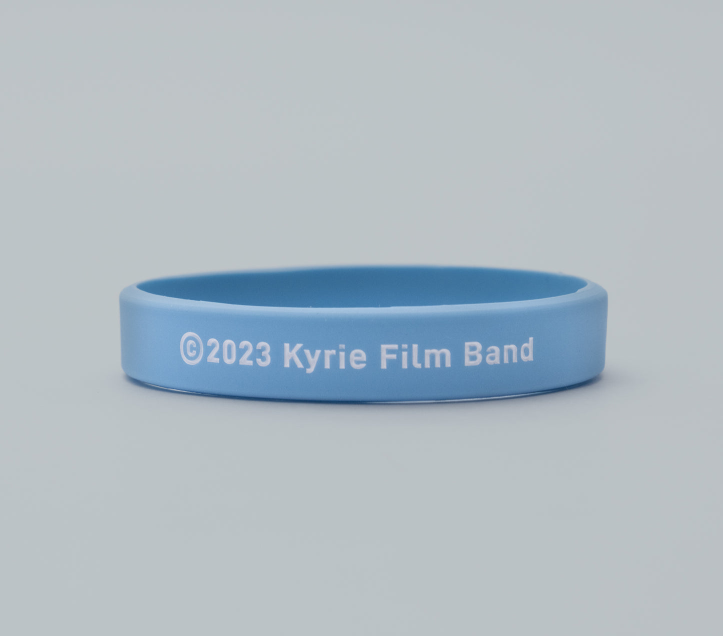 “Kyrie" banda de silicona